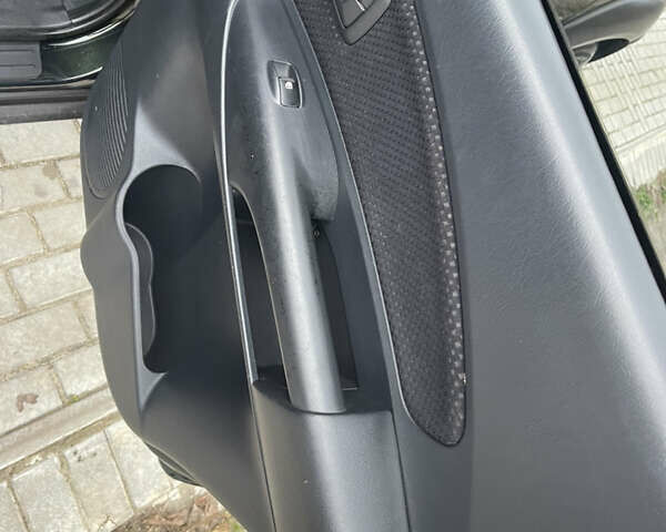 Зеленый Хендай Туксон, объемом двигателя 1.98 л и пробегом 261 тыс. км за 7499 $, фото 128 на Automoto.ua