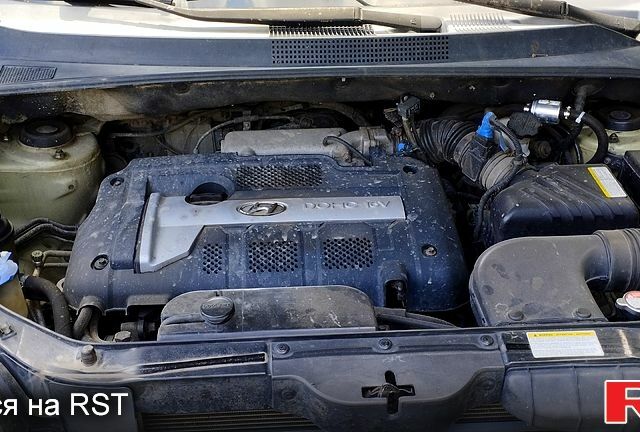 Зеленый Хендай Туксон, объемом двигателя 2 л и пробегом 351 тыс. км за 7000 $, фото 2 на Automoto.ua