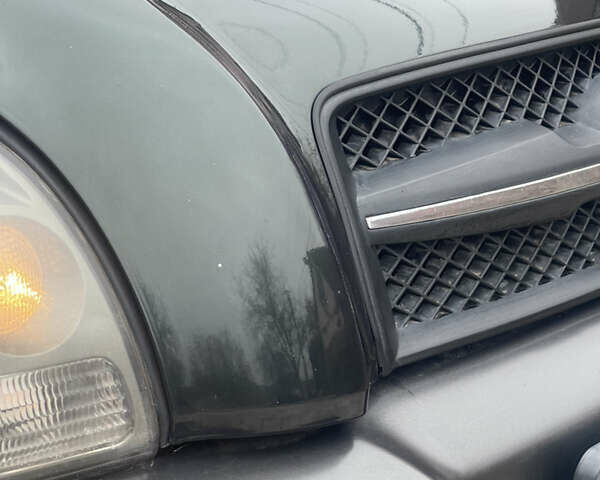 Зеленый Хендай Туксон, объемом двигателя 1.98 л и пробегом 261 тыс. км за 7499 $, фото 38 на Automoto.ua