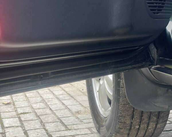 Зеленый Хендай Туксон, объемом двигателя 1.98 л и пробегом 261 тыс. км за 7499 $, фото 61 на Automoto.ua