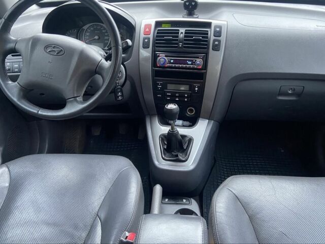 Зеленый Хендай Туксон, объемом двигателя 2 л и пробегом 200 тыс. км за 8500 $, фото 10 на Automoto.ua