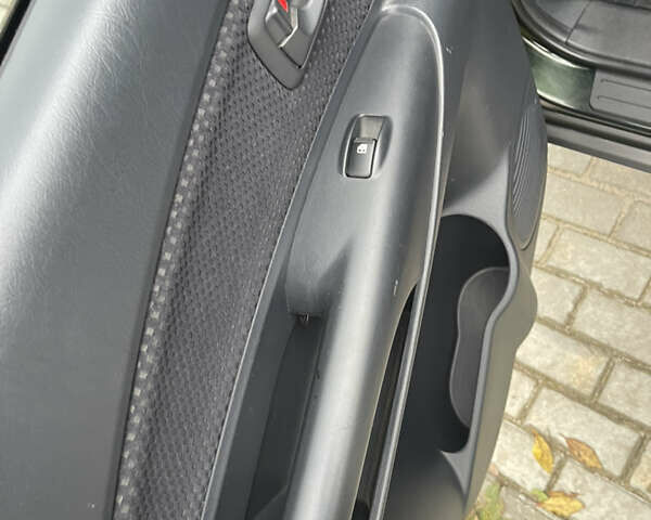 Зеленый Хендай Туксон, объемом двигателя 1.98 л и пробегом 261 тыс. км за 7499 $, фото 121 на Automoto.ua