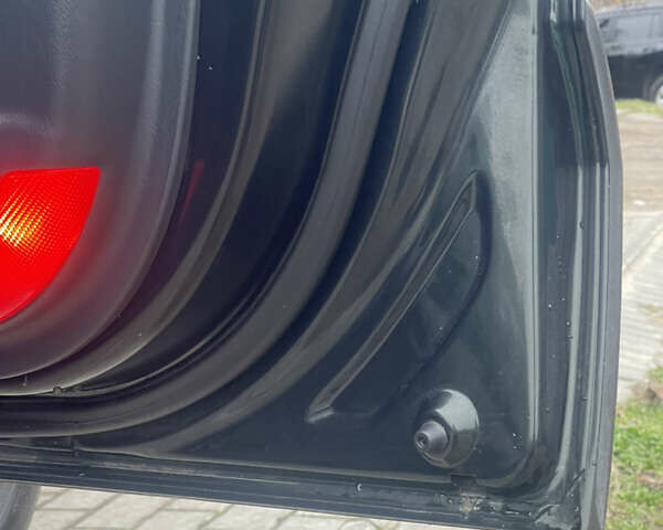 Зеленый Хендай Туксон, объемом двигателя 1.98 л и пробегом 261 тыс. км за 7499 $, фото 75 на Automoto.ua