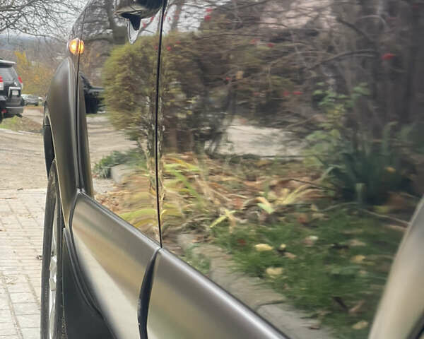 Зеленый Хендай Туксон, объемом двигателя 1.98 л и пробегом 261 тыс. км за 7499 $, фото 33 на Automoto.ua