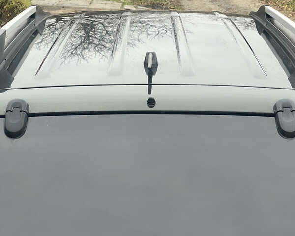 Зеленый Хендай Туксон, объемом двигателя 1.98 л и пробегом 261 тыс. км за 7499 $, фото 59 на Automoto.ua