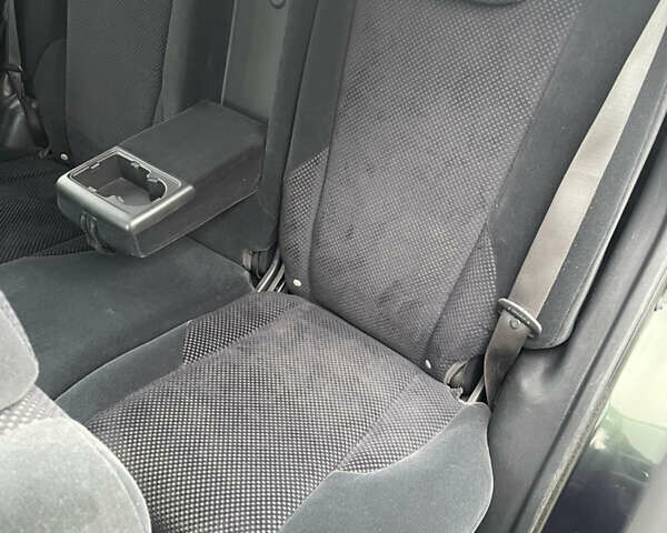 Зеленый Хендай Туксон, объемом двигателя 1.98 л и пробегом 261 тыс. км за 7499 $, фото 122 на Automoto.ua