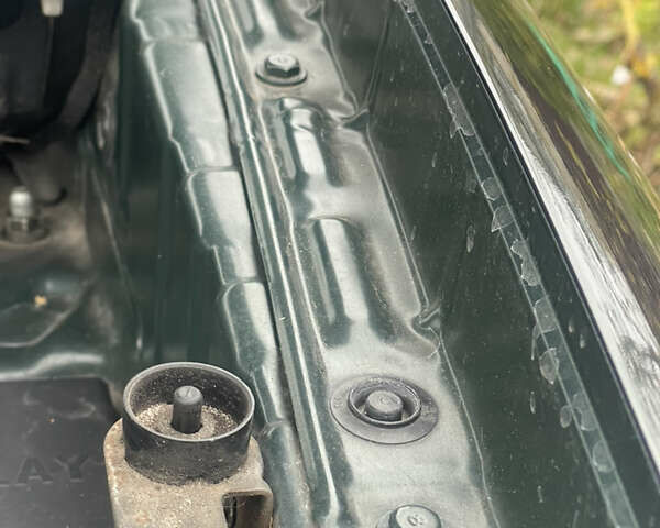 Зеленый Хендай Туксон, объемом двигателя 1.98 л и пробегом 261 тыс. км за 7499 $, фото 81 на Automoto.ua