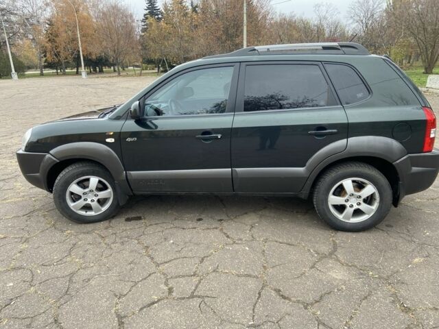 Зеленый Хендай Туксон, объемом двигателя 2 л и пробегом 200 тыс. км за 8500 $, фото 8 на Automoto.ua