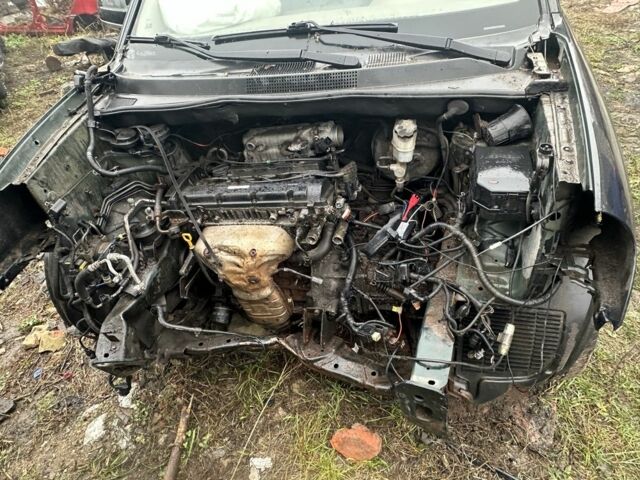 Зелений Хендай Туксон, об'ємом двигуна 2 л та пробігом 180 тис. км за 3700 $, фото 6 на Automoto.ua