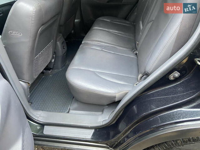 Зеленый Хендай Туксон, объемом двигателя 1.98 л и пробегом 200 тыс. км за 8500 $, фото 16 на Automoto.ua