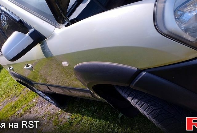 Зеленый Хендай Туксон, объемом двигателя 2 л и пробегом 351 тыс. км за 7000 $, фото 5 на Automoto.ua