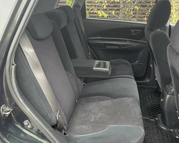 Зеленый Хендай Туксон, объемом двигателя 1.98 л и пробегом 261 тыс. км за 7499 $, фото 125 на Automoto.ua