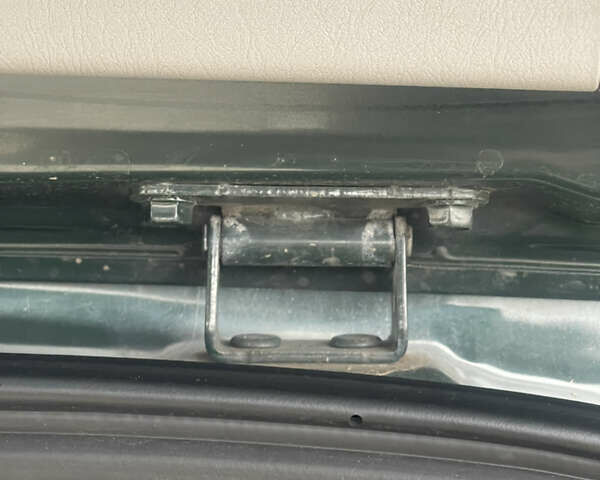 Зеленый Хендай Туксон, объемом двигателя 1.98 л и пробегом 261 тыс. км за 7499 $, фото 68 на Automoto.ua