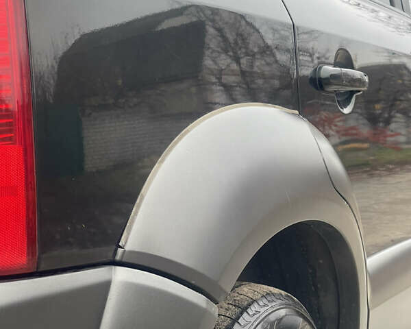 Зеленый Хендай Туксон, объемом двигателя 1.98 л и пробегом 261 тыс. км за 7499 $, фото 42 на Automoto.ua