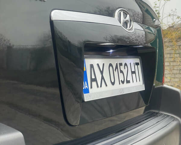 Зеленый Хендай Туксон, объемом двигателя 1.98 л и пробегом 261 тыс. км за 7499 $, фото 31 на Automoto.ua