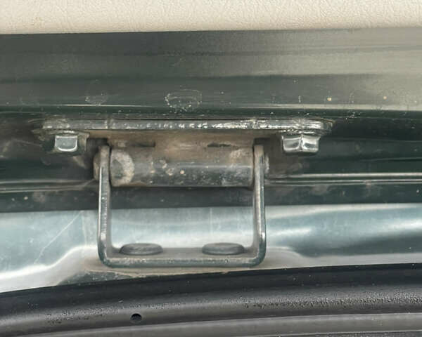 Зеленый Хендай Туксон, объемом двигателя 1.98 л и пробегом 261 тыс. км за 7499 $, фото 69 на Automoto.ua