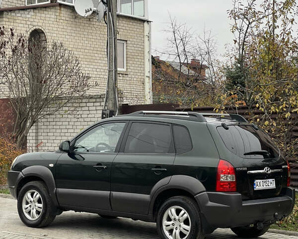 Зеленый Хендай Туксон, объемом двигателя 1.98 л и пробегом 261 тыс. км за 7499 $, фото 14 на Automoto.ua