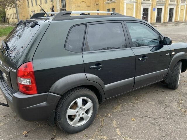 Зеленый Хендай Туксон, объемом двигателя 2 л и пробегом 200 тыс. км за 8500 $, фото 4 на Automoto.ua