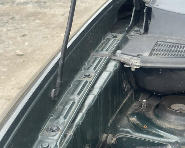 Зеленый Хендай Туксон, объемом двигателя 1.98 л и пробегом 261 тыс. км за 7499 $, фото 82 на Automoto.ua