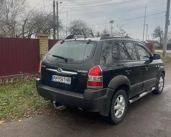 Зеленый Хендай Туксон, объемом двигателя 2 л и пробегом 201 тыс. км за 7600 $, фото 5 на Automoto.ua