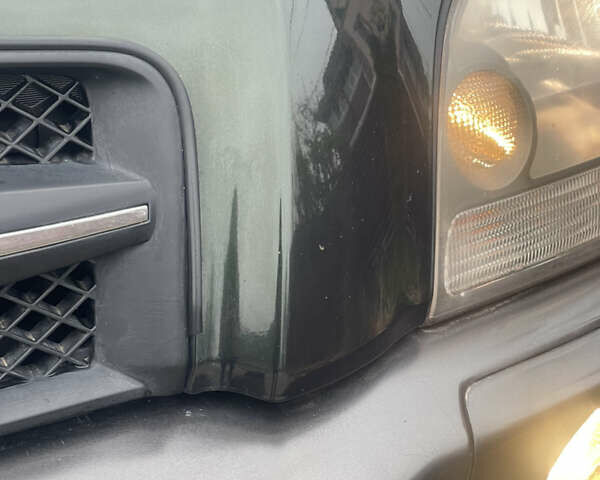 Зеленый Хендай Туксон, объемом двигателя 1.98 л и пробегом 261 тыс. км за 7499 $, фото 37 на Automoto.ua