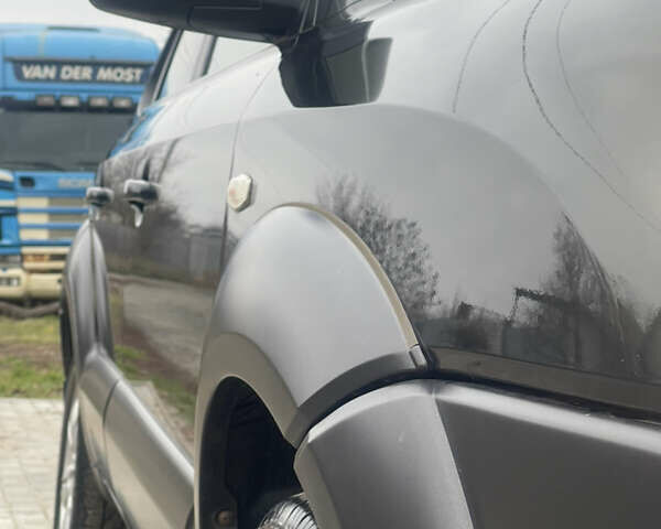 Зеленый Хендай Туксон, объемом двигателя 1.98 л и пробегом 261 тыс. км за 7499 $, фото 41 на Automoto.ua