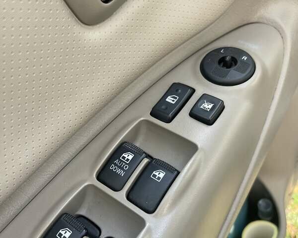 Зеленый Хендай Туксон, объемом двигателя 2 л и пробегом 201 тыс. км за 7600 $, фото 14 на Automoto.ua