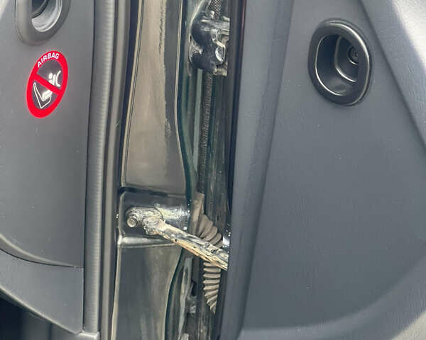 Зеленый Хендай Туксон, объемом двигателя 1.98 л и пробегом 261 тыс. км за 7499 $, фото 78 на Automoto.ua