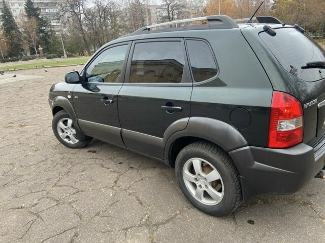 Зеленый Хендай Туксон, объемом двигателя 2 л и пробегом 200 тыс. км за 8500 $, фото 6 на Automoto.ua