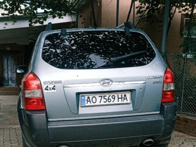 Зеленый Хендай Туксон, объемом двигателя 2 л и пробегом 289 тыс. км за 6800 $, фото 1 на Automoto.ua