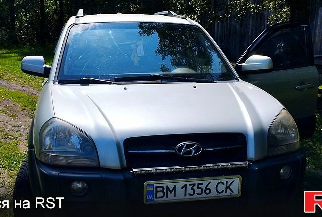 Зеленый Хендай Туксон, объемом двигателя 2 л и пробегом 351 тыс. км за 7000 $, фото 9 на Automoto.ua