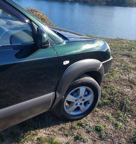 Зелений Хендай Туксон, об'ємом двигуна 2 л та пробігом 137 тис. км за 8500 $, фото 10 на Automoto.ua