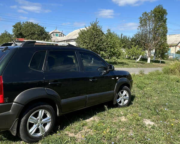 Зелений Хендай Туксон, об'ємом двигуна 1.98 л та пробігом 301 тис. км за 8350 $, фото 3 на Automoto.ua