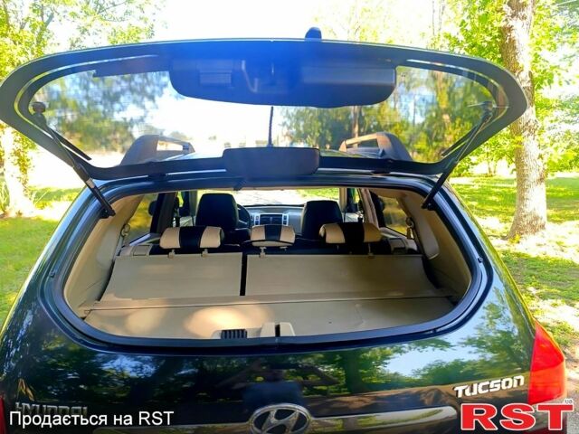 Зеленый Хендай Туксон, объемом двигателя 2 л и пробегом 210 тыс. км за 7699 $, фото 11 на Automoto.ua