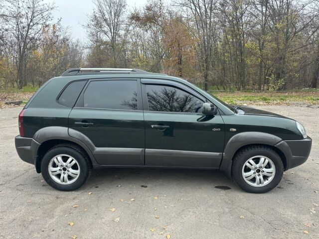 Зеленый Хендай Туксон, объемом двигателя 2.7 л и пробегом 250 тыс. км за 7850 $, фото 6 на Automoto.ua