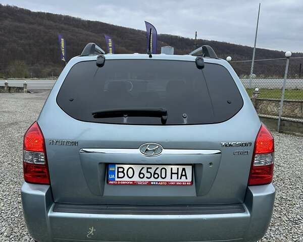 Зеленый Хендай Туксон, объемом двигателя 2 л и пробегом 190 тыс. км за 8450 $, фото 13 на Automoto.ua