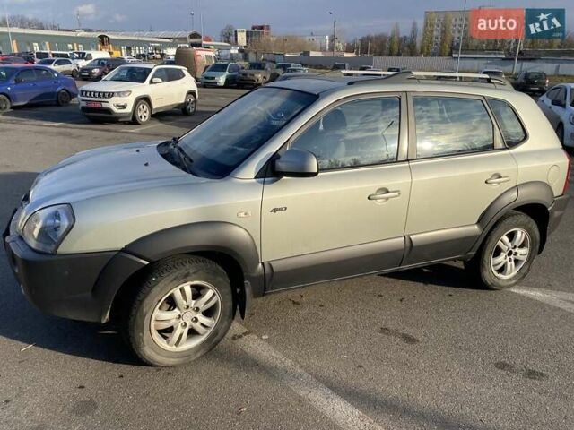 Зелений Хендай Туксон, об'ємом двигуна 1.98 л та пробігом 330 тис. км за 7000 $, фото 11 на Automoto.ua