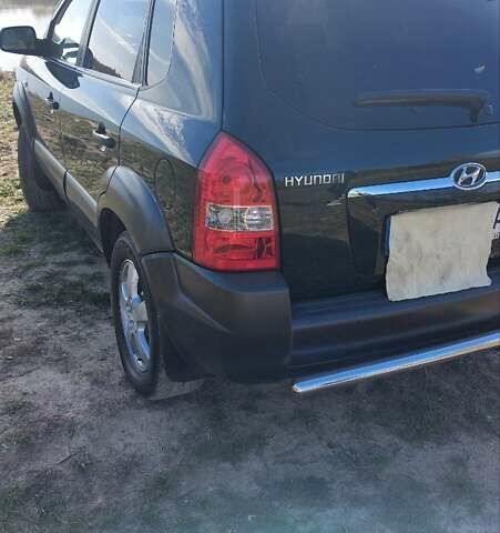 Зелений Хендай Туксон, об'ємом двигуна 2 л та пробігом 137 тис. км за 8500 $, фото 5 на Automoto.ua