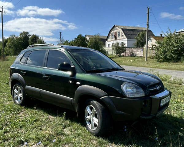Зелений Хендай Туксон, об'ємом двигуна 1.98 л та пробігом 301 тис. км за 8350 $, фото 7 на Automoto.ua