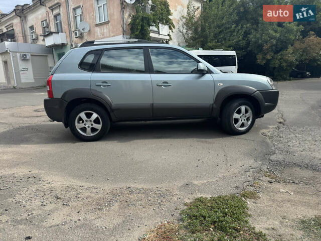 Зелений Хендай Туксон, об'ємом двигуна 1.98 л та пробігом 234 тис. км за 7800 $, фото 4 на Automoto.ua