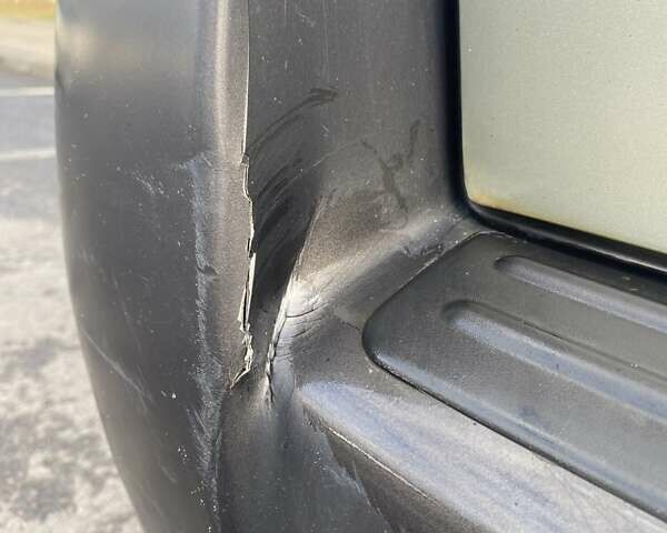 Зелений Хендай Туксон, об'ємом двигуна 1.98 л та пробігом 330 тис. км за 7000 $, фото 24 на Automoto.ua