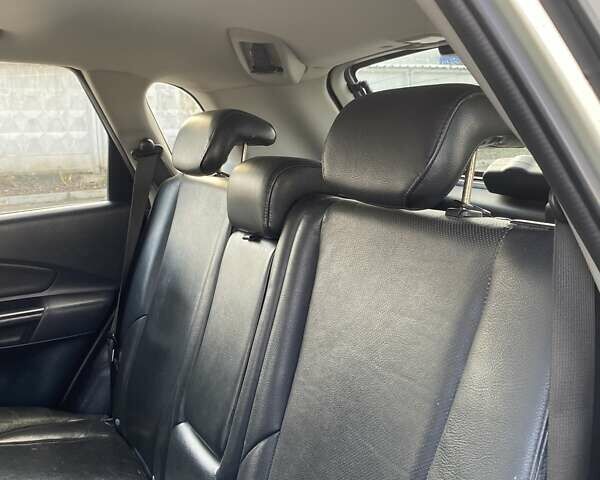 Зелений Хендай Туксон, об'ємом двигуна 1.98 л та пробігом 330 тис. км за 7000 $, фото 20 на Automoto.ua