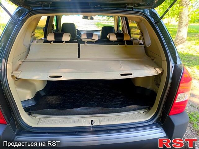 Зеленый Хендай Туксон, объемом двигателя 2 л и пробегом 210 тыс. км за 7699 $, фото 10 на Automoto.ua