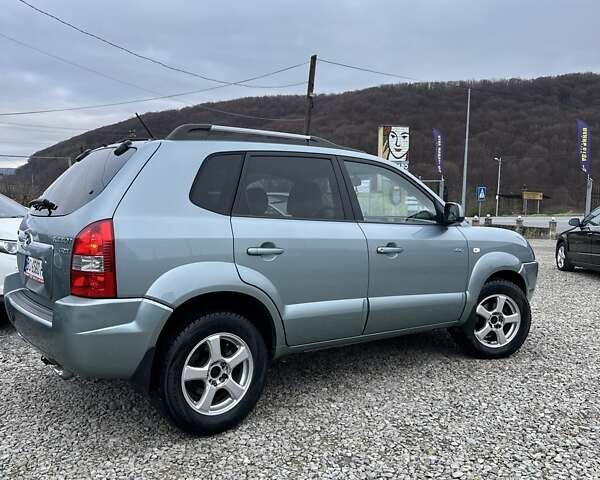 Зеленый Хендай Туксон, объемом двигателя 2 л и пробегом 190 тыс. км за 8450 $, фото 16 на Automoto.ua