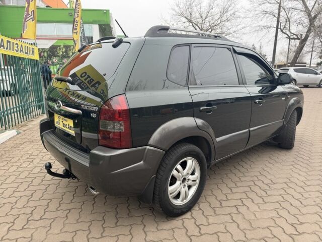 Зеленый Хендай Туксон, объемом двигателя 2.7 л и пробегом 250 тыс. км за 7850 $, фото 6 на Automoto.ua