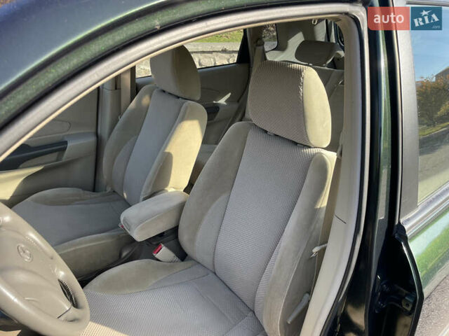 Зеленый Хендай Туксон, объемом двигателя 1.99 л и пробегом 208 тыс. км за 7600 $, фото 7 на Automoto.ua