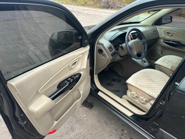 Зеленый Хендай Туксон, объемом двигателя 2.7 л и пробегом 250 тыс. км за 7850 $, фото 9 на Automoto.ua