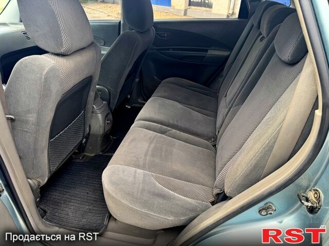 Зеленый Хендай Туксон, объемом двигателя 2 л и пробегом 234 тыс. км за 7999 $, фото 7 на Automoto.ua