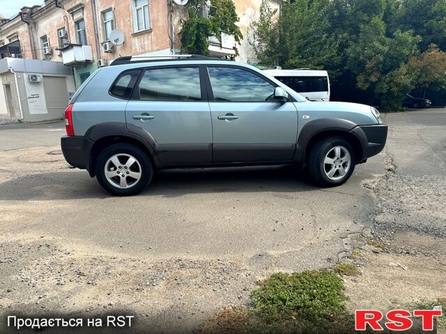 Зеленый Хендай Туксон, объемом двигателя 2 л и пробегом 234 тыс. км за 7999 $, фото 3 на Automoto.ua
