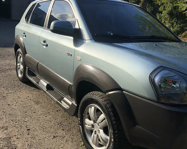 Зелений Хендай Туксон, об'ємом двигуна 1.98 л та пробігом 105 тис. км за 9200 $, фото 4 на Automoto.ua